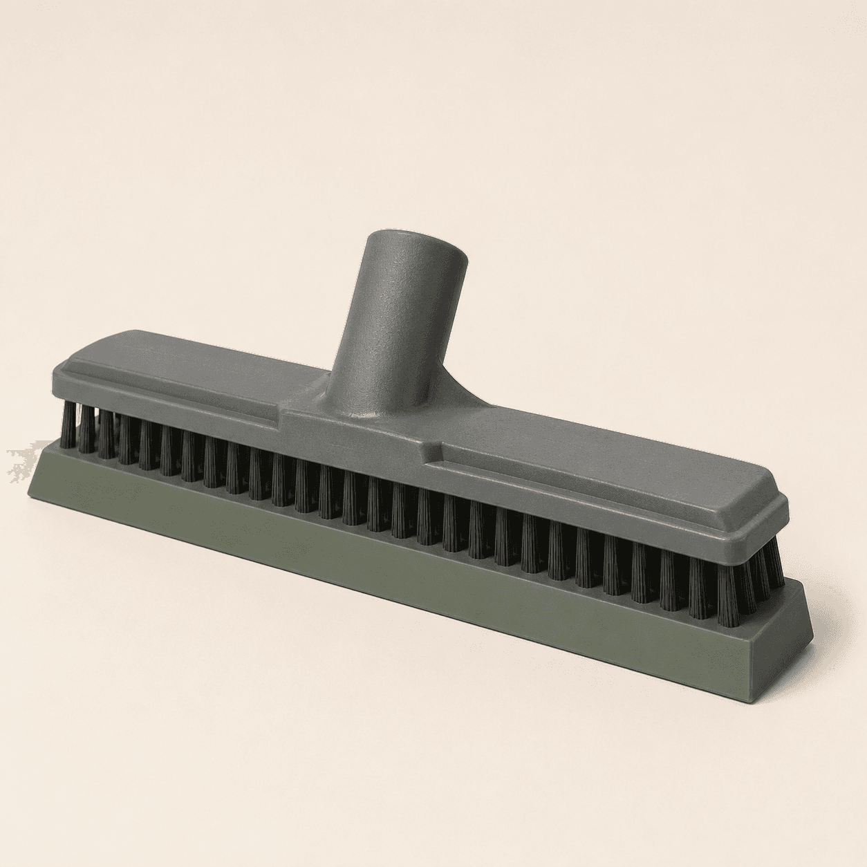 Outdoor Floor Squeegee — Stiff-bristle head with a moss-green rubber blade for paving and decking.